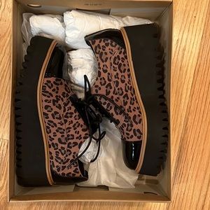 All Black platform leopard print shoes.